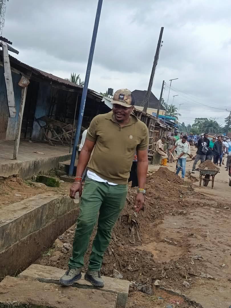 The Chairman at a community sanitation exercise